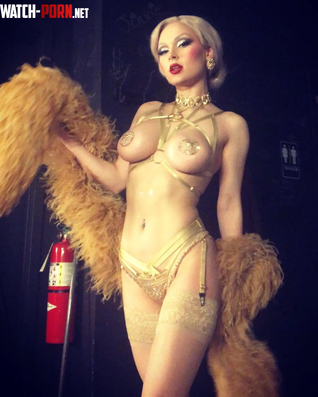 The fire extinguisher really adds to the 60s vibe by LilChereBear