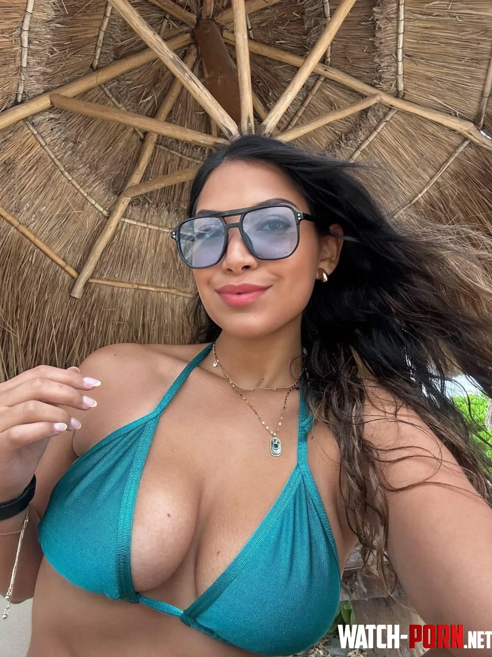 Cleavage on the beach by SoftnStacked