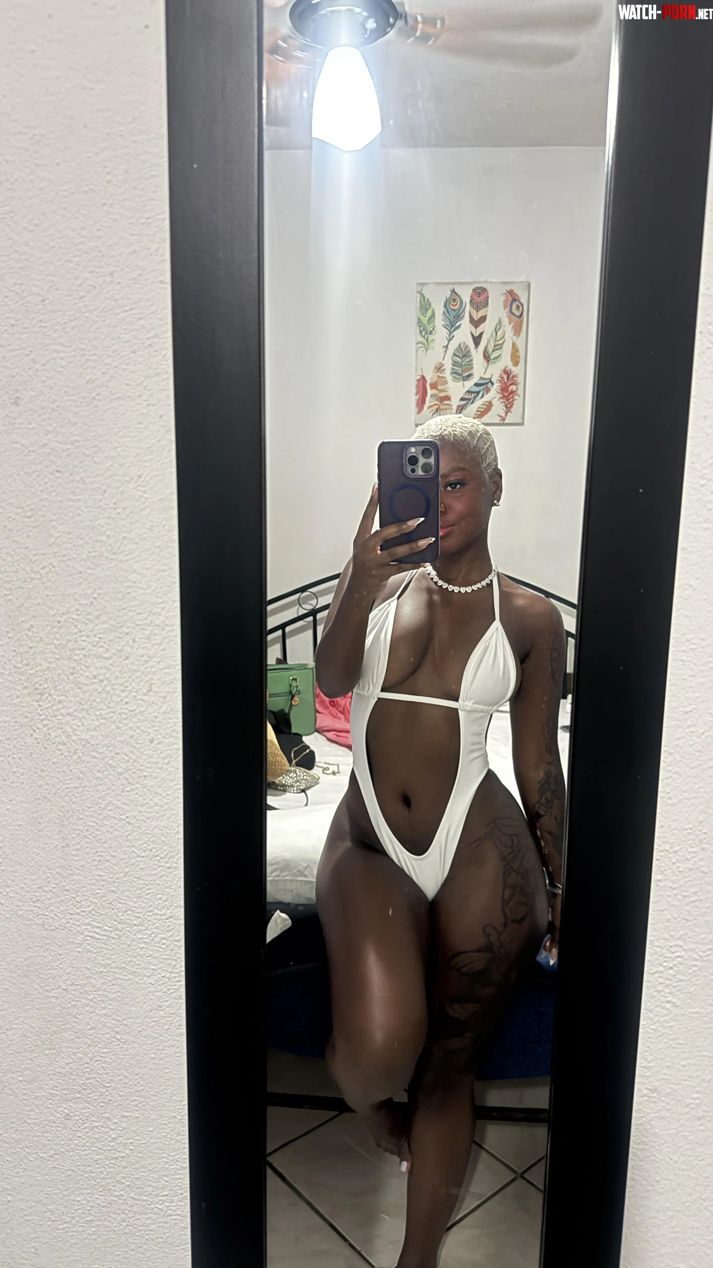 A black woman in a white swimsuit is sure to turn heads by sweetangel2620