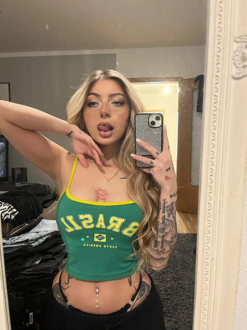 Thumbnail Belly Piercing Showcased in CharmVoice_'s Cropped Blouse