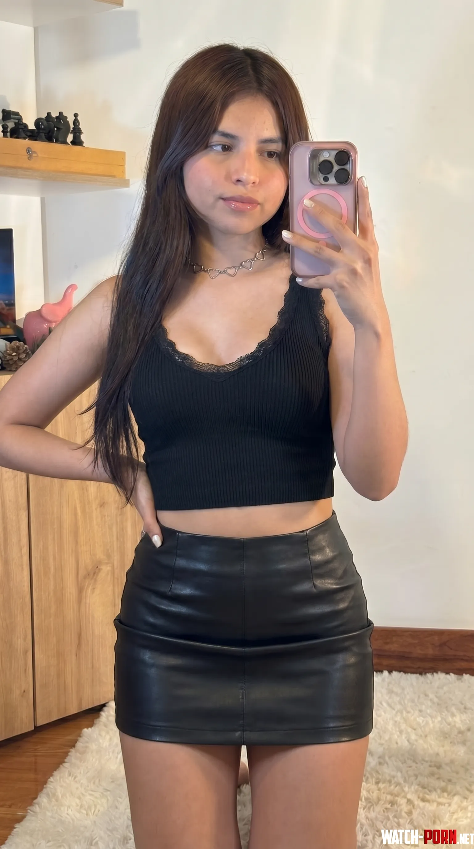 Leather skirt so tight it hugs every curve by GirlySeduction