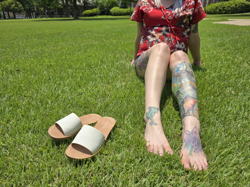 Thumbnail The-Electric-Sky Shares Tattooed Legs in the Park: A Fashionable Stroll