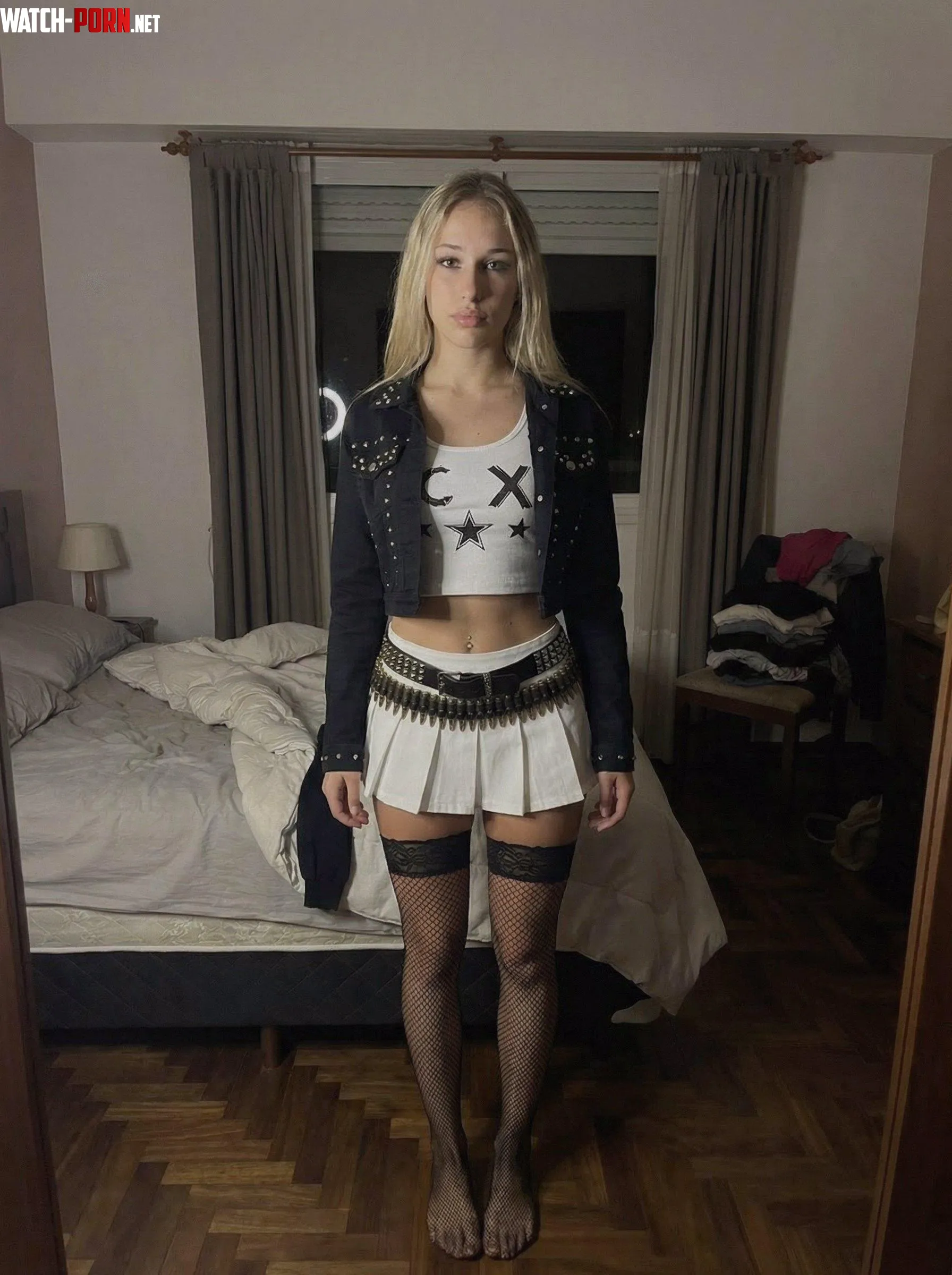 Leather goddess showing off her favorite pieces by PinkPetalDazzle