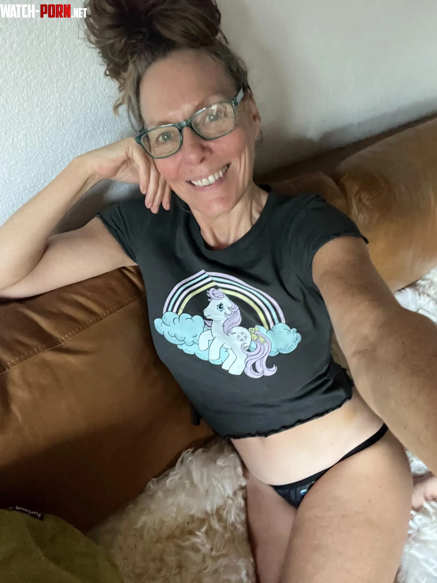 Crop top, glasses, and a kind of MILF energy you can't ignore.  59yo by Mrseviemae