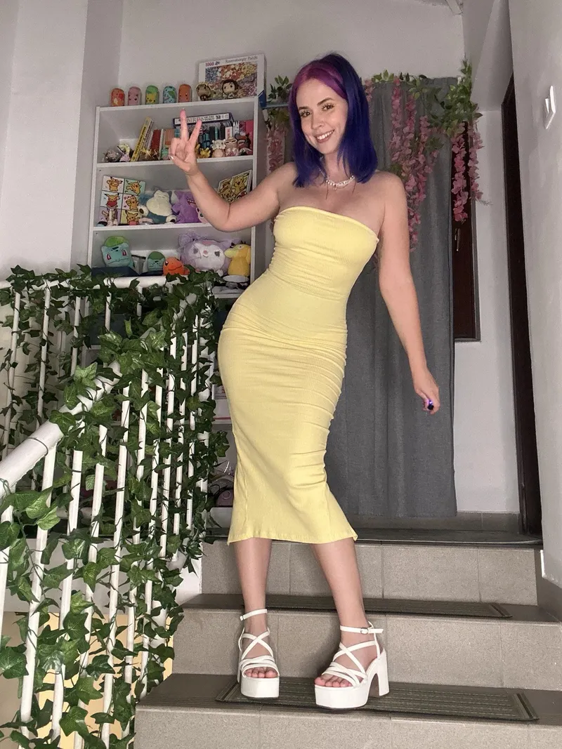 Thumbnail Spreading Joy in a Yellow Tight Dress by CharmingMistress