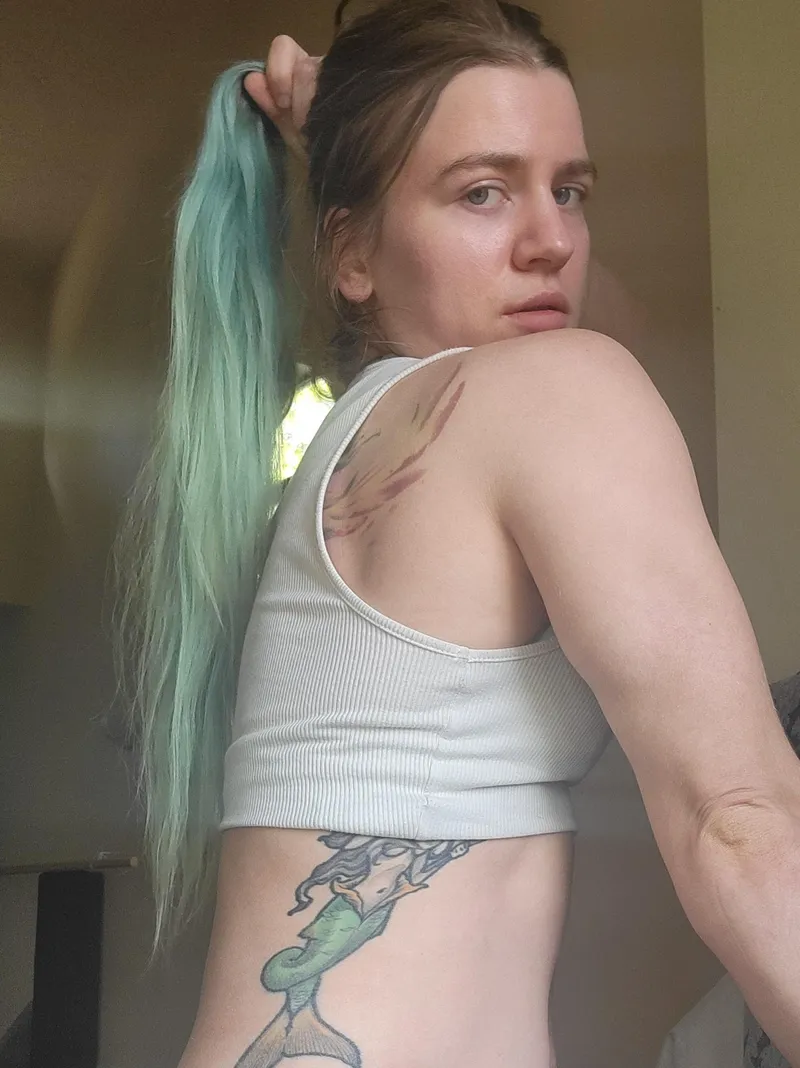 Thumbnail Captivating Contrasts: Long Hair Restrained in a Ponytail by KinkyContortionist