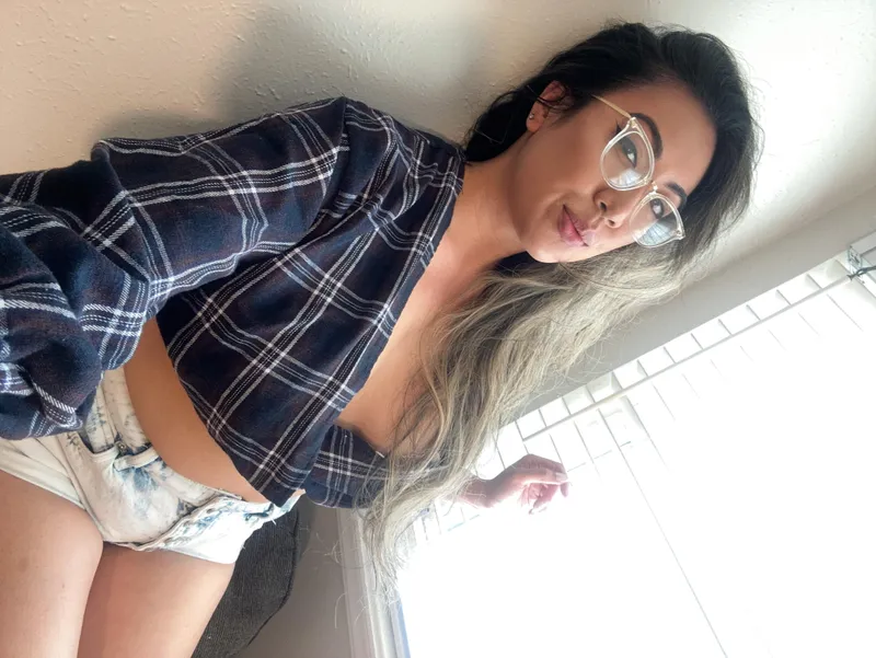 Thumbnail Sitting cutely on a couch