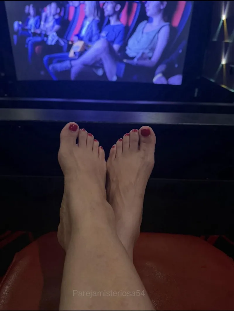 Thumbnail OC My husband took me to the movies last night, but he spent the whole time staring at my red toes. Do you blame him? 🎬😈