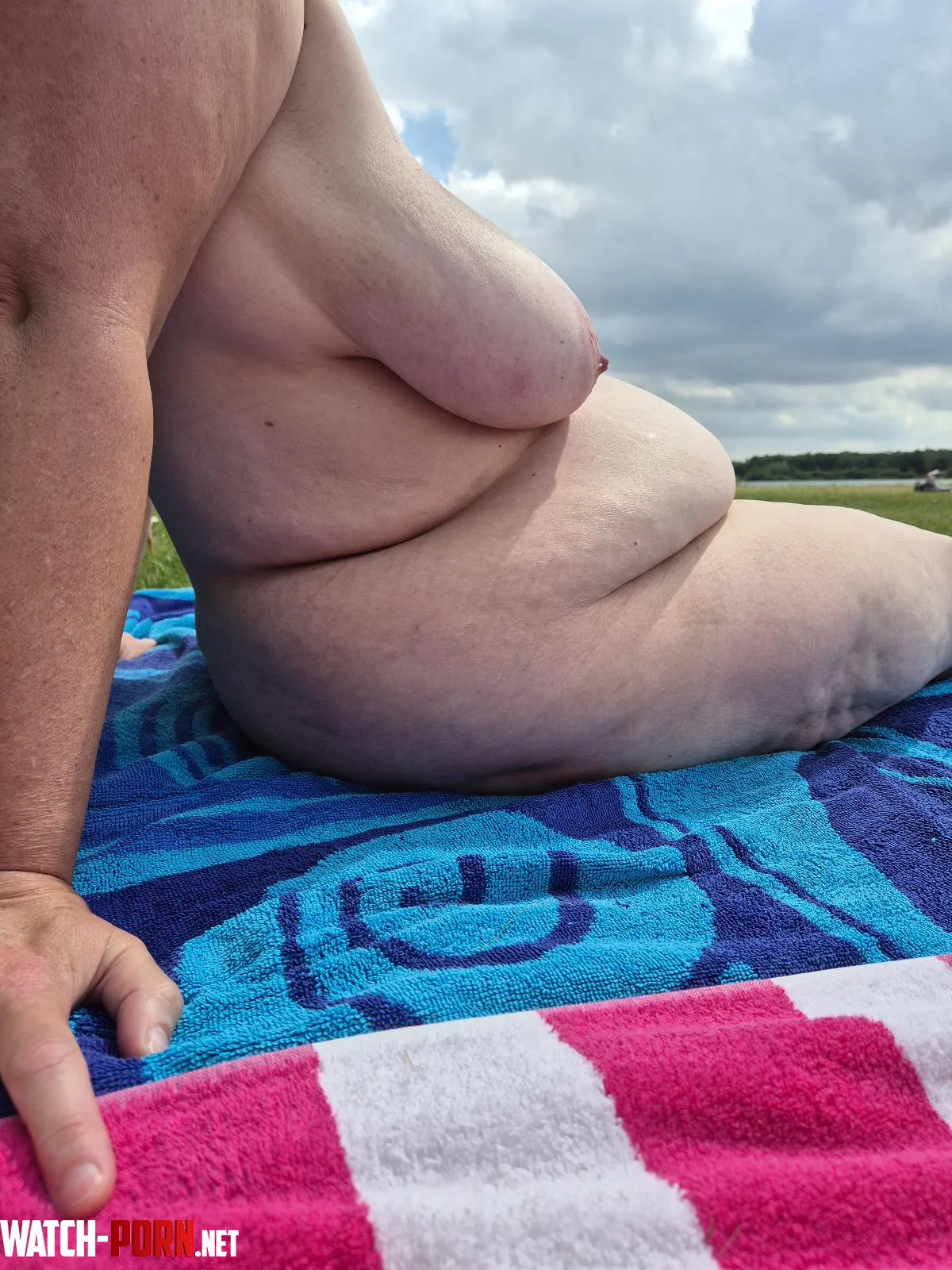 My wife enjoying the sun on her perfect body. by Krommetje1967