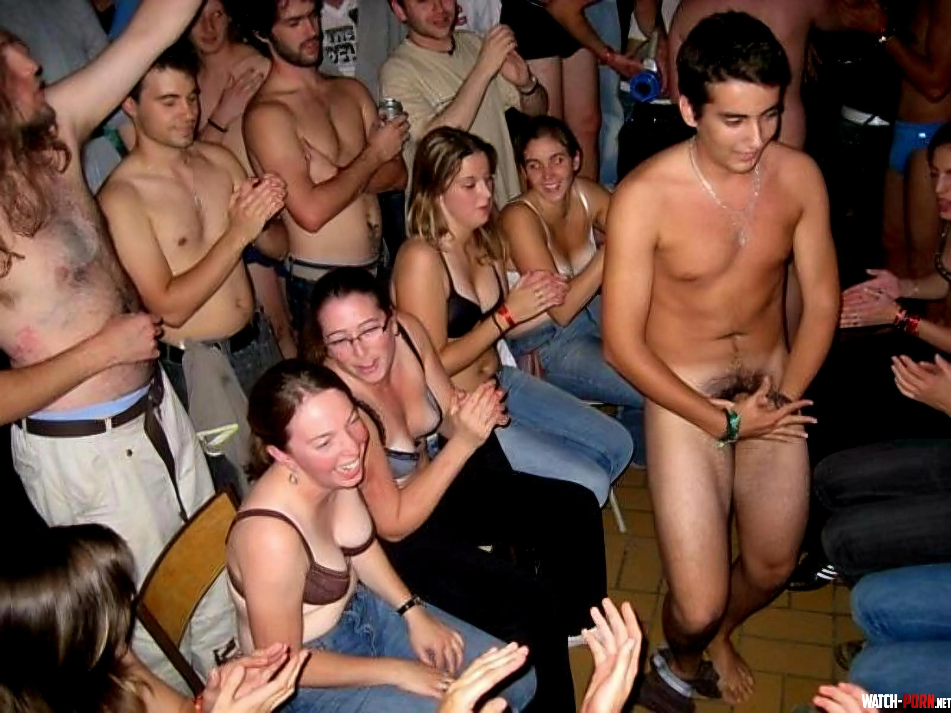 Another male student at a college initiation, reluctant to show his female peers his cock by CFNMaddict32