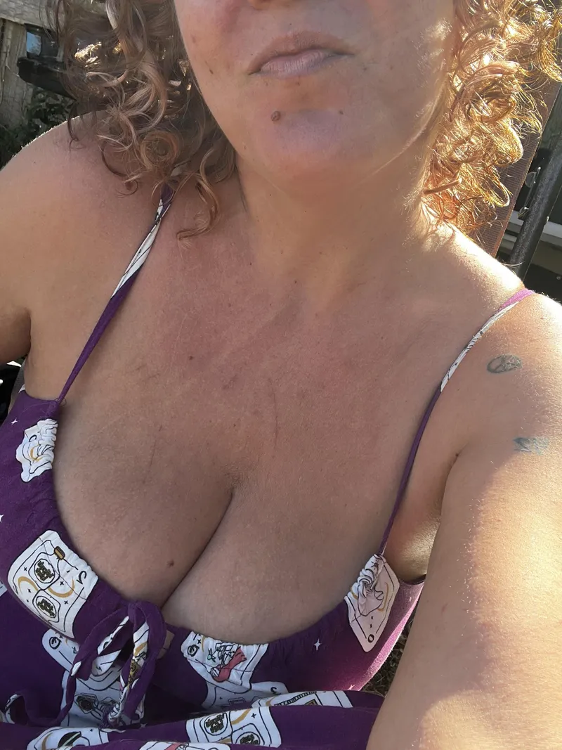 Thumbnail No bra cleavage hanging outside on this beautiful day. by ItsMeToriD